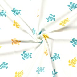 Tessuto Jersey Tartarughe Giallo Turchese e Arancione Sfondo Bianco Sporco | Tessuti Lupo