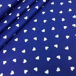 Tessuto di Cotone con Cuori Bianchi su Fondo Blu | Tissus Loup