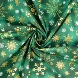 Tessuto di Cotone Fiocchi di Neve dorati e Bianchi su sfondo verde | Tissus Loup